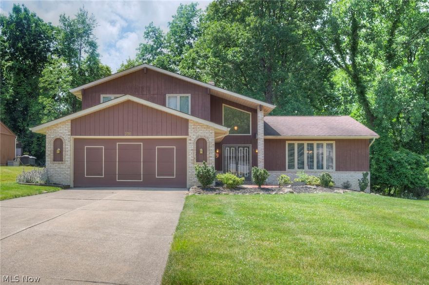 SPACIOUS SPLIT LEVEL HOME IN SOUTH EUCLID~This house Exemplifies the Pride of Ownership!  Beautifully designed split level located on the border of South Euclid and Richmond Heights. Large Double Doors lead to an open Foyer and to the left, is the Living Room that is adjacent to the Dining Room. Vaulted Ceilings and lots of windows that allows Natural Light.  Large Eat In Kitchen with plenty of Counter Space and Appliances that comes with the home. Custom Built Kitchen Set has Under Seat Storage and stays with the house as well. Snuggle up next to a warm Cozy Fire in the Family Room that has a Brick Overlayed Fireplace and a Wet Bar. This Room is great for entertaining Guest and Family Gatherings. The Family Room also has a walk-out deck that will make a great place for outdoor grilling and a hot tub. Main level has a Bedroom and Full Bath and 3 additional Full Size Bedrooms Upstairs.  Large Master Bedroom has a En-suite Master Bath, Walkin Closet and Built-In Vanity.  Partially Finish