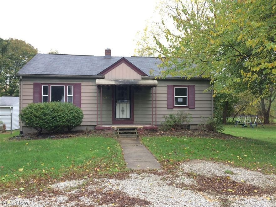 Large 4 bedroom Ranch 2 fire places. 2+ garage entrance off Kenmore Ave. Fantastic location! backs into city park.