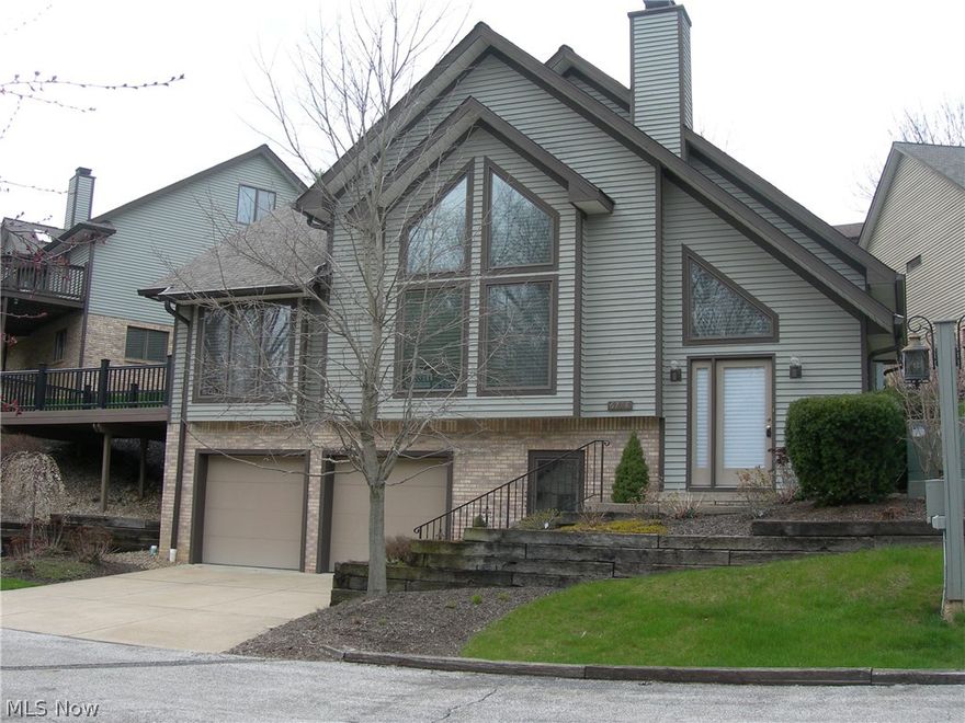 Welcome to this absolutely stunning 3-BR, 3-BA, free standing,  Cape Cod,  Condominium,  located on a private court in Windward Hills (PHASE ll / NEAR $50,000 IN RESERVED FUNDS). This meticulously maintained condo offers an open floor plan with natural paint finish and carpeting throughout.  First fl offers: * an impressive two story Great Rm with an outstanding view through the stunning wall of windows and a gas burning fire place * large eat-in Kitchen that leads out to the custom built Deck * dumb waiter for groceries / etc..from garage to the Kitchen * Master Bedroom w/walk in closet * Master Bath and Guest Bath and plenty of storage.  Upper level offers * two large bedrooms w/full bath * large storage rm and a great balcony view overlooking the two story Great Rm.  New in 2012:  roof * furnace * Kitchen floor (wood) * Master Bath and walk in closet floor (tile) * Master, Walk-in Closet w/custom built fixtures by?Closet by Design.  Other updates: * Kitchen Stainless Steel Sink w/fi