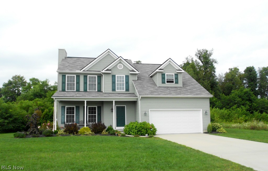Captivating colonial has been tastefully decorated with neutral colors and is just waiting for new owners. The two story foyer welcomes you to the great room with gas fireplace and french doors that lead to the 2-tiered deck. An attractive open floor plan offers a nice eating area and kitchen with plenty of cabinets with pull out shelves, granite countertops, travertine backsplash, recessed/dimmer switch lighting, SS appliances and a nice pantry. Both the convenient first floor laundry and powder room feature travertine tile floors. The master suite has one of the largest walk-in closets I have ever seen (7 x 15) and includes a master bath with soaking tub, double sinks, and walk in shower. The other 2 bedrooms are good size and have ample closet space. The basement has been pre-plumbed for a full bath, ideal for creating a future additional living space. A totally private fenced backyard with custom built stamped concrete fire pit and a vegetable garden complete this home. Pro