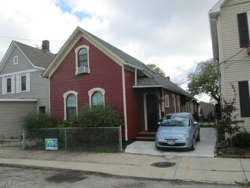 Renovated home with over 2,200 square feet.  Original charm with modern layout.  True first floor master bedroom with walk in closet and in-suite bathroom including double vanity, claw foot tub, separate shower and marble mosaic floor.  New kitchen includes vaulted ceilings, plentiful cabinets, granite counters, stainless steel appliances, farmers sink and original pantry.  Large laundry room adjacent to kitchen.  First floor includes a second full bath, an intimate library complete with secret passage and dramatic period style 2 story entry.  Second floor includes 2 additional bedrooms a 3rd full bath, loft and large bonus room.  Unique 4,500 sqft lot is just 2 blocks from Lincoln Park on owner occupied block in the heart of historic Tremont.  New garage with rear access plus additional drive in the front.  Full width rear porch, side deck, flag stone patio along with plenty of extra yard space for outdoor living.