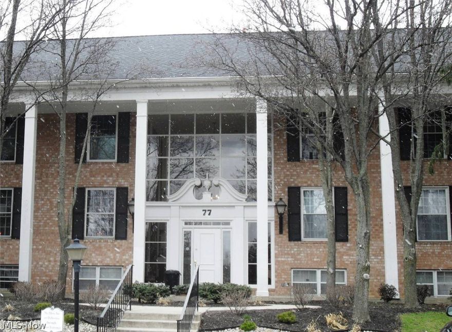 Located in the Heart of Historic Hudson, The Versailles of Hudson.  Great condo within 1/2 mile of shopping center and restaurants.  Rare 2 bedroom, 2 bath with dining room, slider off living room leads to deck and view of grass area.  Garage included, laundromat, community pool.  Maintenance fee includes heat, trash removal, snow removal and association insurance.