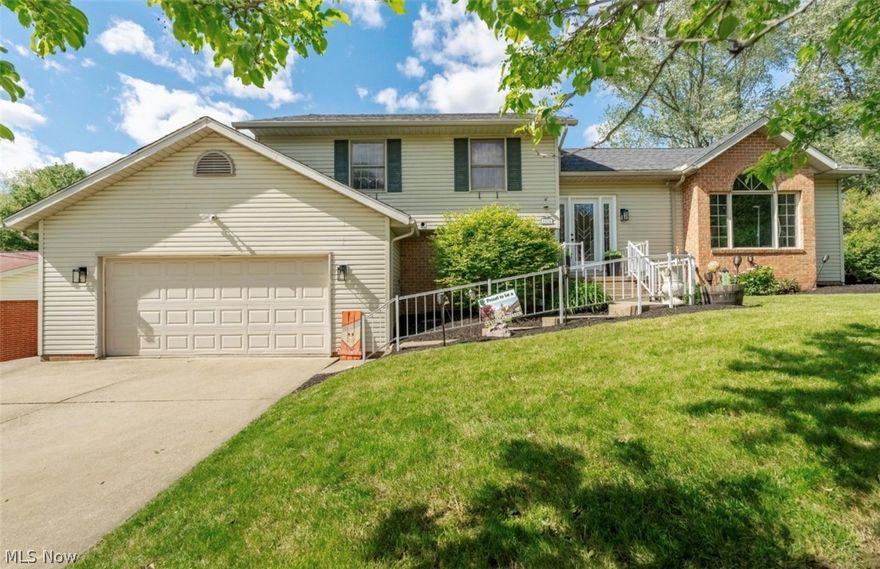 Welcome to 1870 Stoner Ave. NE!  A beautifully maintained home, that offers a full in law suite (equipped with full kitchen and bath) or teenage dream wing.  The perfect blend of comfort, space, and everyday functionality. Nestled on a generous, fully fenced in lot in an established neighborhood, this spacious 4-bedroom, 4-bath residence features over 2,900 square feet of living space designed for both relaxing and entertaining.  
Step inside to discover inviting open concept  living areas filled with natural light, a warm and welcoming fireplace, stunning light fixtures, and a layout that flows effortlessly from room to room. The 3 season room includes giant hot tub that stays with the property. Outside, the expansive yard offers plenty of room for gatherings, play, or simply enjoying peaceful Ohio evenings.

Whether you’re hosting family holidays, enjoying quiet mornings at home, or creating lasting memories with loved ones, this property delivers the space and charm to make it all possible. Conveniently located near shopping, dining, parks, and schools, 1870 Stoner Ave. NE is more than just a house — it’s a place to truly feel at home  Open enrollment is optional if desired -as well as private school choices. Roof in 2026 , natural gas generator to stay.