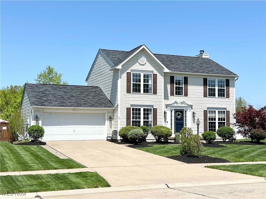 Welcome to this beautifully updated home in the desirable Meadow Lakes Community of North Ridgeville! Situated on one of the larger sized lots at .26 acre, this spacious home offers 4 bedrooms, 3.5 baths, and over 3,000 sq. ft. of living space, including a finished basement with plenty of room for relaxation and entertaining. As you step inside, you’re greeted by a foyer flanked by a study with French doors, and a living room with elegant molding. The updated kitchen is a true highlight, featuring granite countertops, modern appliances, and a double door pantry for extra storage. It opens to a cozy family room with a stunning wood-burning fireplace and views of the spacious morning room. From the morning room, sliding doors lead to a large deck that overlooks a fully fenced backyard, offering a peaceful retreat and ample space for outdoor gatherings, complete with a patio and hot/cold hose bib for added convenience. The master suite is generously sized and boasts an updated en-suite bathroom with a jetted jacuzzi tub, a separate all-glass shower with tile surrounds, and granite countertops. The additional three bedrooms are also generously sized with ample closet space, and some feature decorative molding and wall paneling. The finished basement provides a fantastic additional living area, featuring built-ins, surround sound wiring, and a full bathroom. Plus, there's a large storage area in back to keep everything organized. This home’s location is equally impressive, offering the serene beauty of Meadow Lakes with its rolling hills, ponds, and walking trails, and it’s just moments from Sandy Ridge Reservation. Enjoy the privacy of having no shared neighbors behind the lot, providing an added sense of peace and tranquility. With improvements throughout, including flooring, decorative molding, updated bathrooms and kitchen, and a finished basement, this home is ready for its next owners. Make this your new home – schedule your private showing today!