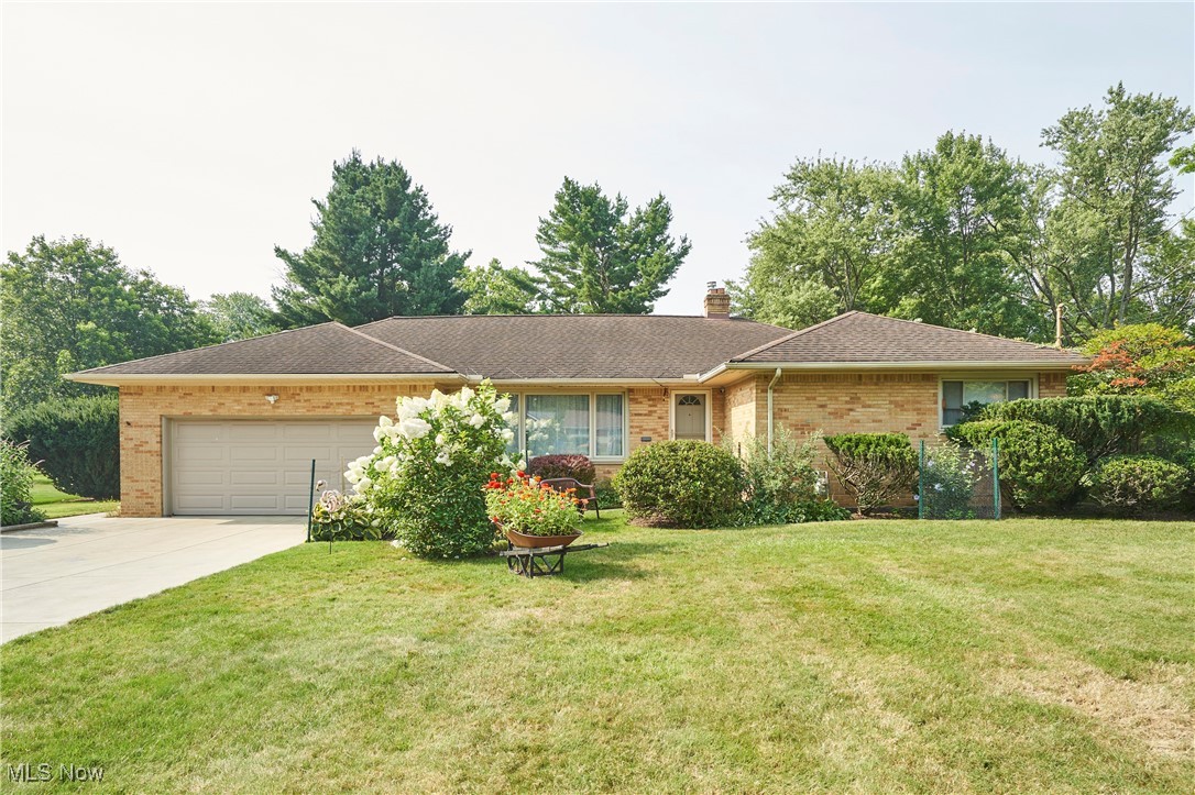 For the first time in 36 years, this lovingly maintained brick ranch is being offered for sale by its proud owner. Nestled on a truly picturesque lot in desirable North Royalton, this 3-bedroom, 2-bathroom gem radiates warmth, care, and pride of ownership at every turn. Surrounded by meticulously curated landscaping and vibrant flower beds, this home is a gardener’s paradise and a peaceful retreat all in one.
From the moment you pull up, the curb appeal is undeniable. The recently redone double-wide driveway with an added parking pad and new sidewalks welcomes you home. Step inside and you’ll be greeted by an oversized family room with gleaming hardwood floors, soft modern tones, and abundant natural light pouring through the large picture window.
The updated galley-style kitchen is as beautiful as it is functional, boasting sleek white cabinetry, granite countertops, and brand-new stainless steel appliances. The adjacent dining area is perfect for everyday meals or hosting family and friends. Down the hallway, you’ll find a fully remodeled bathroom and three generously sized bedrooms, each offering ample closet space and continued hardwood flooring underfoot.
Downstairs, the finished basement provides the ultimate space to relax or entertain, featuring a cozy media area, a fireplace, built-in wet bar, and a second full bath. Whether it's movie night or game day, this lower-level retreat has it all.
Step outside to the covered patio and enjoy peaceful evenings overlooking the lush backyard. Additional features include an oversized heated two-car garage, a 16x12 two-level shed with endless possibilities, and countless thoughtful upgrades that make this home truly special.
Located minutes from Memorial Park and its scenic lake, trails, courts, splash pad, and top-ranked schools—including the brand-new elementary—this is more than just a home, it’s a legacy. Schedule your private showing today and experience it for yourself!