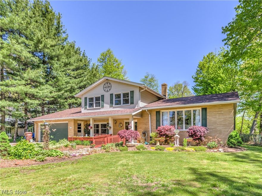 Wonderful 4 level split on tranquil approx. .9/acres with 4 bedrooms, 2 bath, approx. 1912SF, 2 car attached garage plus 24x50 pole barn* Approx. 2/3 brick exterior, replacement windows (except 3-living room, dining room & family room), shingles 2004, updated kitchen & bathrooms, 2 tier deck, fenced back yard & covered front porch* Screened porch with fireplace* Foyer entry with ceramic floor*. Vaulted living room & dining room* Kitchen with Kraftmaid cabinets, granite, gas range, microwave, refrig, dishwasher plus disposal, ceramic floor & access to 2 tier deck with pergola* Family room with fireplace with wood burner insert* One bedroom on 1st floor* 2nd level with 3 bedrooms and hall with wood floors* Water softener* Deck reinforced for hot tub* Well & Septic completed 9/2016* Home warranty provided*