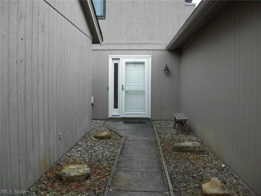 Welcome to this great three bedroom, 2.5 bath Townhouse in Co-Moor Colony. So much has been updated, all ceramic 2017, cabinets re-faced, newer counter tops, newer sink & faucet. Appliances 2016, furnace and heat pump 2014, large open living room with wood burning fireplace (with insert ) opens to private patio and beautiful view. Windows and doors 2015 with life time warranty. All light fixtures 2017, half bath completely redone, all outlets and smoke alarms 2017. Sewer and water average 130.00 every 3 months, electric averages between 100-140.00. Master bath redone 2017, master has large walk-in-closet plus extra closet for HIM.  Upper level offers easy care laminate flooring, 2 car attached garage with attic storage. A really great updated unit close to everything.