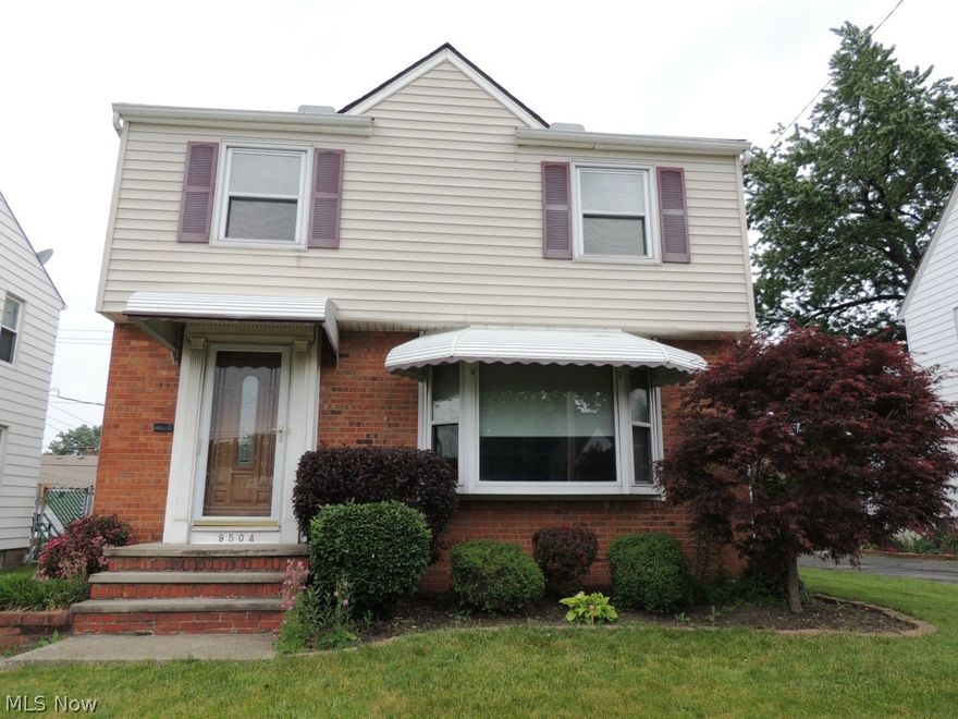 Cute Colonial offers 3 Bedrooms and 1.5 Baths with a great location! Walking Distance to The Big Creek Parkway, shopping and more! Eat-In Kitchen, Dining Room and Spacious Living Room. Rec. Room in Basement as well as 1/2 Bath, Laundry and storage aplenty. Upstairs offers 3 generously sized bedrooms and full bath. The back yard has a sharp stamped concrete patio perfect to relax and entertain on as well as a 2 car garage. Recent updates include Newer Windows, Doors, Siding, Roof, Furnace and H20 tank. A great place to call HOME! Schedule to see today, don't miss out!