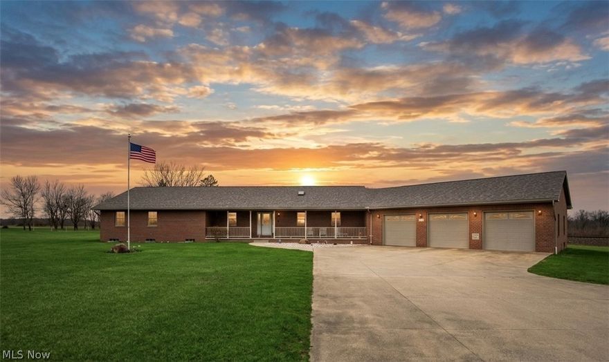 Welcome home to this beautiful brick ranch located in the quiet town of Berlin Center! Nestled on a peaceful stretch of countryside, this home offers the perfect blend of privacy, space, and rural tranquility. Surrounded by scenic views and open land, it's an ideal setting for those looking to escape the hustle while still being within convenient reach of nearby amenities. The home features a spacious layout with an abundance of natural light, creating a warm and inviting atmosphere throughout. Whether you're relaxing in the comfortable living areas or enjoying a meal in the dining area, you'll appreciate the functional flow and cozy feel! The beautiful trim work and cabinetry is custom made and handcrafted locally. The attached, oversized 3 car garage provides all the space you need to keep your vehicles out of the weather and room for all of your tools and equipment. Outside, the property truly shines with generous yard space perfect for outdoor entertaining, gardening, or simply enjoying the quiet surroundings. There's ample room for expansion, hobbies, and all your projects. The property offers a versatile opportunity for a variety of lifestyles! Schedule your tour now to soon be enjoying country living at its finest!