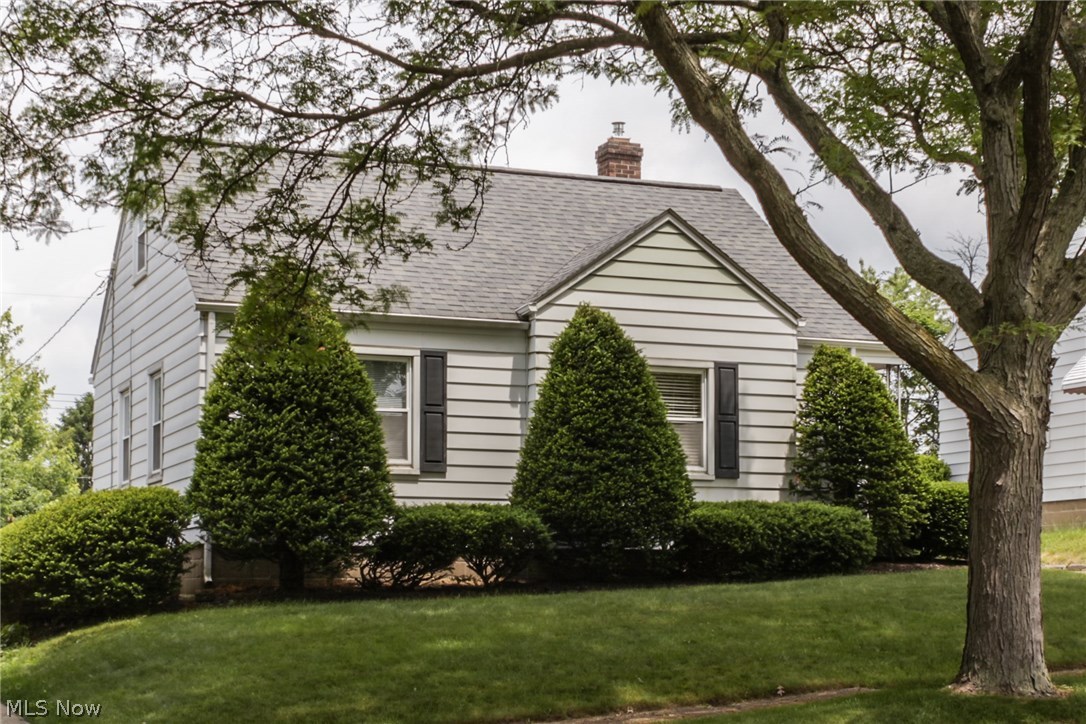 Absolutely charming and meticulously maintained Cape available on a lovely street in Firestone Park! Enjoy the beautifully refinished hardwoods in the living room. Bright and sunny eat in kitchen. Updated bathroom, and nicely sized first floor bedrooms. Upstairs is a large bedroom with a built in twin bed (could be 2 built in beds again!) and a great amount of floor space. Plus, you can spread out and enjoy the bonus space in the rec room downstairs!! Detached garage and private and spacious back yard. This home has a TON of upgrades!! Brand NEW furnace and A/C! Replacement windows throughout. Waterproofed basement! So much house for the money! Dont miss it!