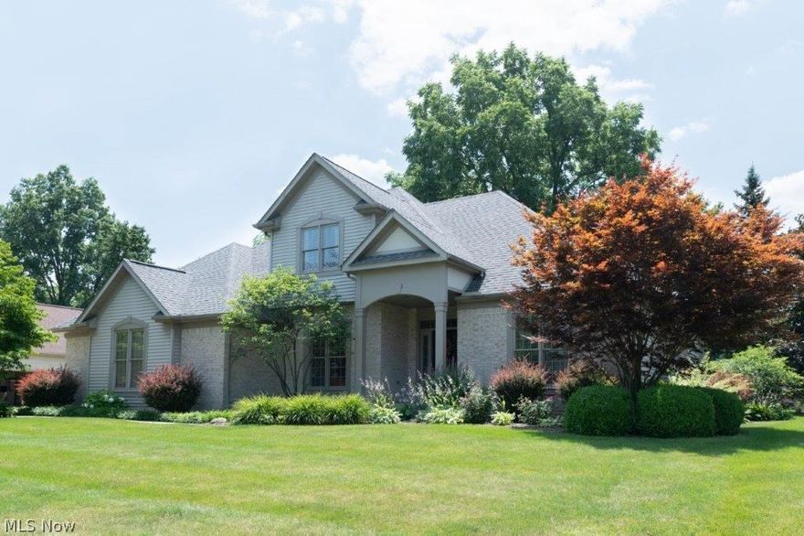 Open great room plan with first floor master suite custom built by Scott McCue Homes. Like new condition with many upgrades & updates. New master bath includes a custom tile waterfall shower, free standing tub and quartz stone vanities. A 2-sided fireplace divides the spacious center island kitchen and hearth room from the sunken great room. The great room includes higher ceilings and french doors that open to the screened porch. Additional french door from kitchen to deck. Private backyard. Formal dining room. 1st floor office with glass french doors. 1st floor laundry. Jack n Jill bath 2nd floor. Additional finished 800 sq. ft. lower level. Don't miss seeing this beautiful home. Immediate occupancy! Furnace replaced 2009, roof 2014, new GDO 2014, new refrigerator & dishwasher 2018, new a/c 2018, updated master bath 2017, new carpet great room & 2nd floor 2016 and hardwood floors in many rooms!