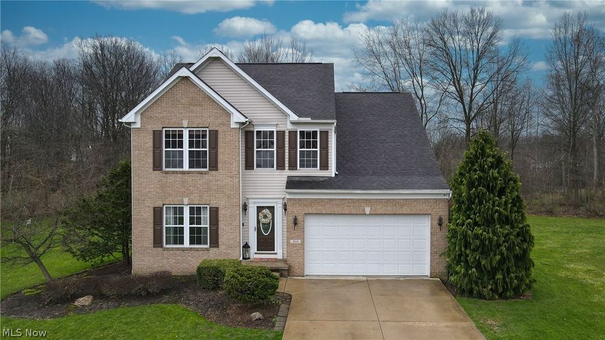 Turn-key contemporary home tucked away in a quiet neighborhood walking distance to Massillon Intermediate & Junior High. Enter through the open foyer which leads into a spacious formal dining area, powder room, and onto the open main living area with a floor-to-ceiling stone fireplace and the kitchen. Sliders from the kitchen take you to a large deck and private wooded back yard oasis with a fire pit and plenty of room to entertain. The first level is rounded out by a laundry room and access to the attached 2-car garage. Head upstairs where you're greeted by a stunning Owner's Suite with en suite bathroom and 3 additional spacious bedrooms and another full bath. The sprawling partially finished basement offers a full wet bar/lounge, an additional living space, a half bath, and a large storage area. The seller is offering a 1-year limited home warranty for added peace of mind. Nothing to do but move in!