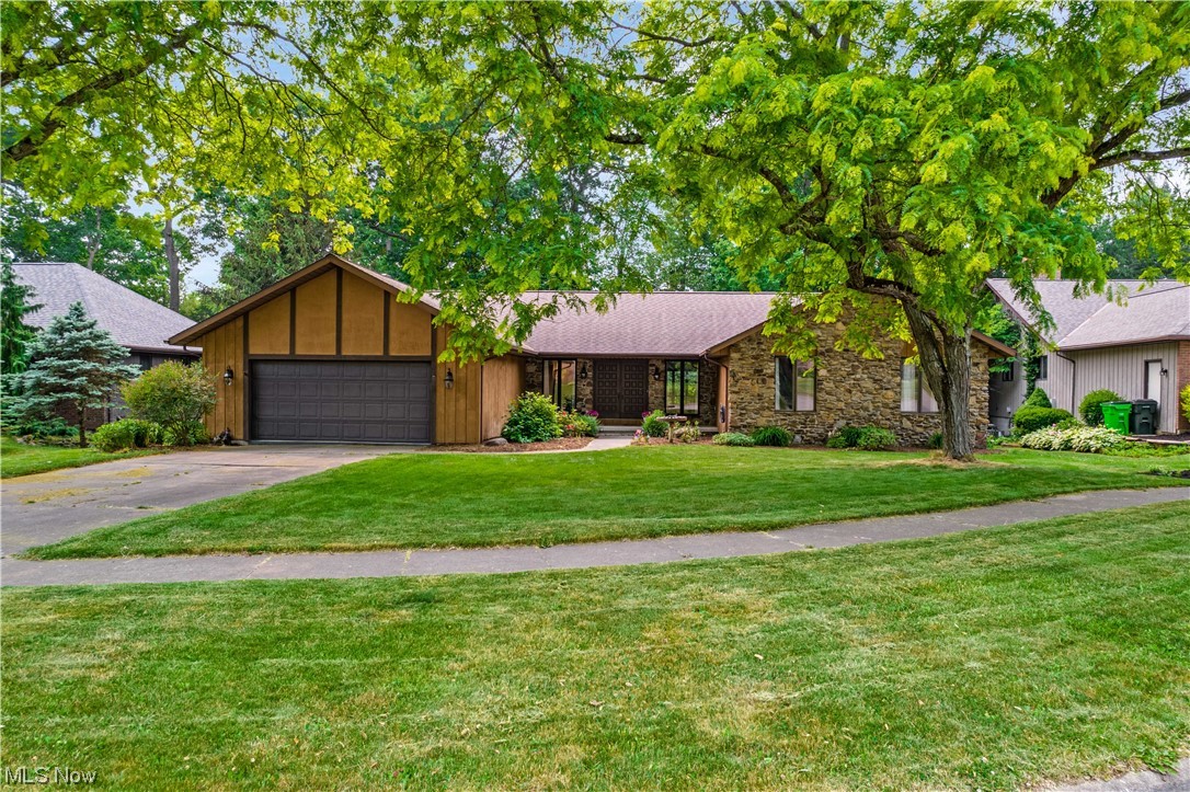Welcome home to 1145 Greensview Drive in Wooster, Ohio. This home checks all the boxes for quiet & easy living. Situated at the end of a quiet street yet right in the heart of Wooster, this home features first floor living with a giant great room, updated kitchen, first floor laundry, family room with gas fireplace, three bedrooms and two full bathrooms. The full basement offers great space to add a recreation room and there is an additional finished room that could act as a fourth bedroom. Out back the yard is abundant with perennial plants in the partially fenced in yard and the screened in porch will make the perfect spot for summertime enjoyment. This home is just waiting on new owners and in perfect time to enjoy summertime BBQ’s and golfing just around the corner.