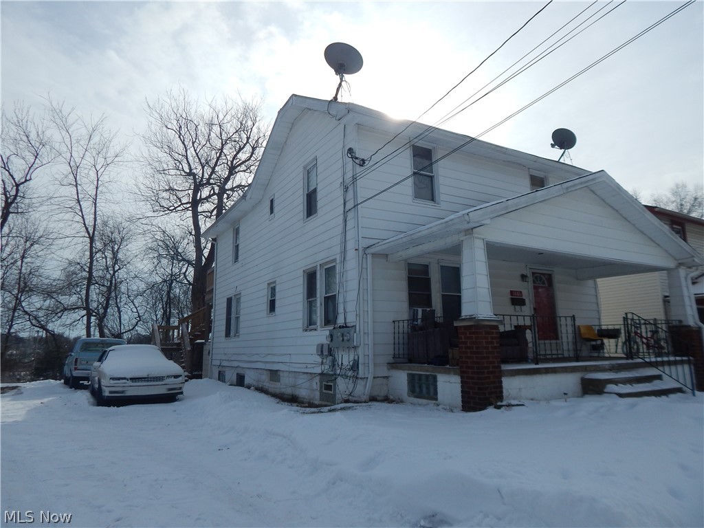 Three unit, current occupied. Front porch, rear deck. double lot 80 x 102.