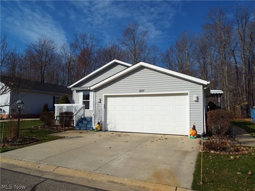 Magnificent home in Lakeside Terrace with side deck, front deck with Sun Setter Awning which provides a place to talk to friends and neighbors or privacy to entertain, barbecue or just sit and relax looking at the views of the woods and pond, along with varieties of wildlife. Home is almost new, move-in
condition. All appliances stay, excluding refrigerator, to make your move almost seamless. Kitchen has an island and also a large eat-in area that will fit a dining room set. Additional storage in the island add to the kitchen area. Sliding glass doors lead off the Family Room to the side deck. Large living
room has a great flow plan and allows for ease in entertaining and furniture placement. The master bedroom is a generous size with large walk-in closet and large master bath with separate shower, large walk-in jetted tub and double sinks, along with a large linen closet. Some handicap features in the home. All
rooms have custom window treatments and most have ceiling fans. A few personal touches will make this home yours. Call for your personal tour today.