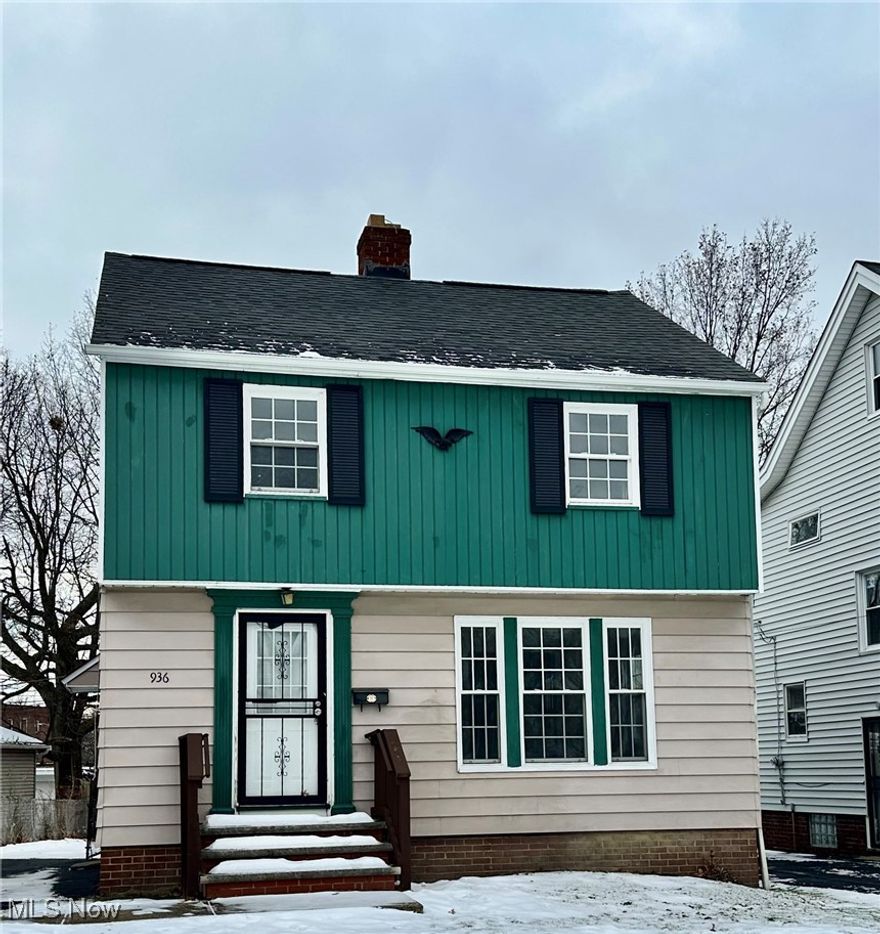 Solid and well maintained Colonial with 2 car detached garage.  Espresso cabinetry with granite countertops in the kitchen.  Beautiful hardwood floors throughout the rest of the house.  Newer vinyl windows, glass block windows in the basement and central air.  Move in condition.