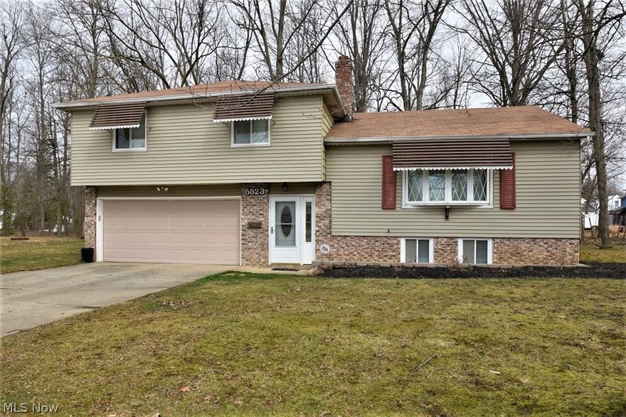 Exceptional home! Beautiful ,fresh, Clean & Bright! Updated tasteful Decor. Updated Baths! Fabulous Maple Kitchen With Breakfast Bar & Open To Dining Room which opens to living room with  gas Logs In Fireplace. Wonderful hardwood floors. Finished recreation room. All appliances stay. Attached 2 car garage. Wooded Rear Yard With Patio. You can move right in!  Amazing convenient location: Close to freeways, shops, restaurants, Trader Joe's & Whole Foods. Also close to University Circle,  hospitals and Universities.