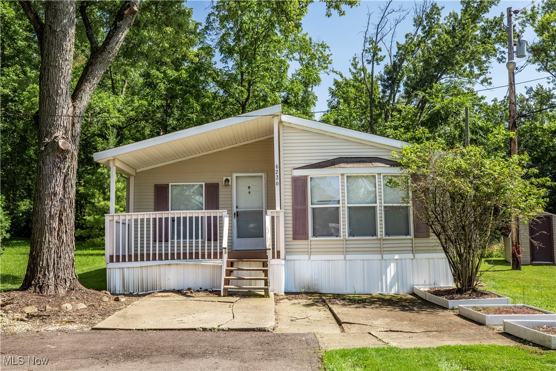 Welcome home to this beautifully built Fairmount Fairpoint mobile home in Ravenna! This home is a 28x40 double wide mobile home that has the look and feel of a traditional ranch style home! Situated in West Park Estates you are only 5 minutes from downtown Ravenna, and 10 minutes from Kent State University. You have three bedrooms, and two full baths, a large yard. This home offers affordability, a large yard, truly one floor living, and is conveniently located close to schools, parks, downtown, and all the major expressways. Schedule a showing and see for yourself how perfect this property would be to call home.