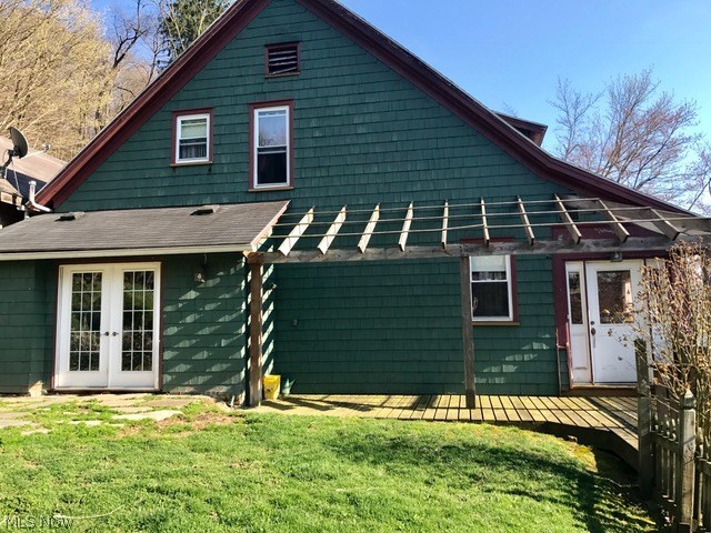 Four bedroom home with many updates. Updates include newer windows, furnace, roof, electric and kitchen. Hardwood floors have been refinished and are in like new condition. Home still has all the old character. Man-cave out back is a must see. Side patio area for those summer days. Call for your private tour today.