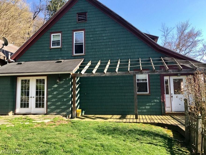 Four bedroom home with many updates.   Updates include newer windows, furnace, roof, electric and kitchen.  Hardwood floors have been refinished and are in like new condition.  Home still has all the old character.  Man-cave out back is a must see.  Side patio area for those summer days.  Call for your private tour today.