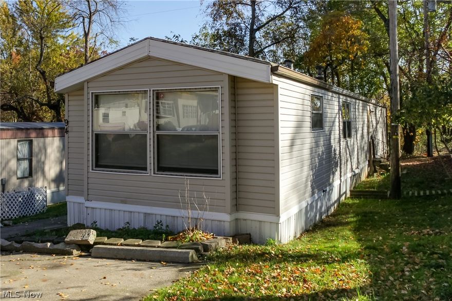 Great home with 2 bedrooms, 2 full baths, and first floor laundry! Don't wait, call to schedule your private showing today. Subject To Park Approval.