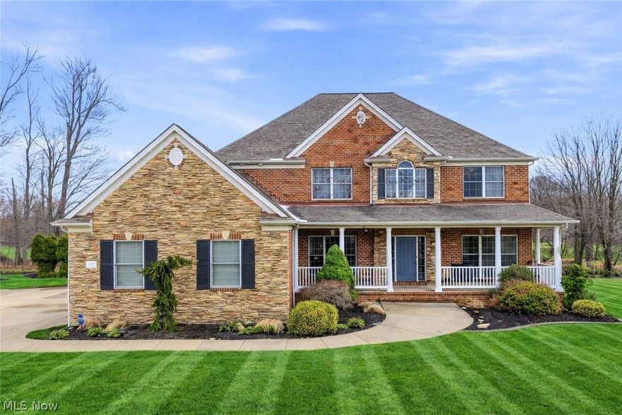 Indulge in elevated luxury living in the highly sought-after golf course community of Aberdeen. Perfectly situated along the 16th fairway of Stonewater Golf Course, this exquisite brick and stone colonial offers 5 bedrooms and 5 full baths, blending timeless elegance with modern comfort. Built and meticulously maintained by the original owner, the home reflects quality craftsmanship and thoughtful design. A grand two-story foyer welcomes you, highlighted by an impressive dual staircase. The open floor plan seamlessly connects the main living spaces, ideal for everyday living and entertaining. The formal dining room is perfect for gatherings, while the dramatic two-story great room features a Stunning Custom Amish-crafted floor-to-ceiling cherry fireplace and a wall of windows showcasing stunning golf course views. The gourmet kitchen offers granite countertops, a breakfast bar, custom cabinetry, walk in pantry and all new appliances (2023), opening to the main living areas. A bright sunroom with bay windows captures fairway views and leads to a Trex deck for easy indoor-outdoor living. The thoughtful layout includes a main floor bedroom, office, and laundry, offering everyday convenience and ease. Each additional bedroom includes a private ensuite with total of 2 jacuzzi tubs and 1 steam shower. The finished lower level offers additional living space with new flooring (2026), plenty of room for a gym, ample storage, and the potential for a sixth bedroom. Additional updates include new upstairs flooring (2023), all new carpet (2024), and an epoxy-coated garage floor (2024). Residents enjoy access to a pool, tennis courts, pickle-ball court, walking trails, golf, exercise room, playground and a community center. Enjoy pool-side golf cart deliveries from on-site Rustic Grill Restaurant, creating a true resort-style experience. A rare opportunity to own an exquisite home in one of the area’s most prestigious, active and welcoming communities!