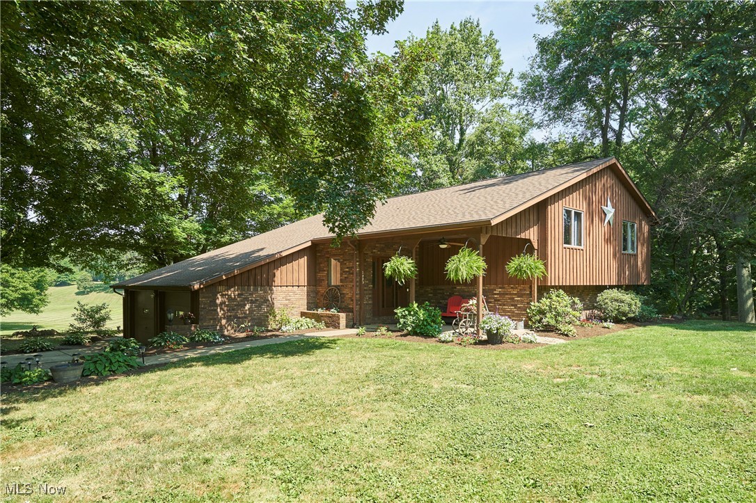 If you'be been looking, look no more. Here it is!!! Make this Custom built home on 3.86 acres with a private serene
setting all yours. The large foyer welcomes you to the Open concept Vaulted Great room ,Kitchen and Dining . The
Wood beam and 2 sided stone fireplace create the perfect focal point. The Remodeled kitchen offers a pantry and
ample cabinetry ,Corian counters and a custom built large center Island with electric and huge drawers. Enjoy access
from the kitchen to the freshly stained exterior deck with views of the private yard. A super fun feature is a pully
system from the house to an adorable treehouse. 2 Bedrooms and a Full bath complete the main floor . The lower level
features 2 bedrooms,a full bath, laundry, Family room with Wood burning stove,beamed ceiling and access to the
Sunroom. There is a largefreshly painted multi purpose room also in the LL to use as fits your needs. The exterior
features a lovely patio for enjoyment of wildlife, a gathering fie pit and the fun of harvesting of
bluberries,blackberries, grapes and apple tree. A chicken coop and 50 x 100 fenced pasture with a gate. New DW,
vinyl plank flooring and carpet 2025,Roof 2024, New Septic 2022