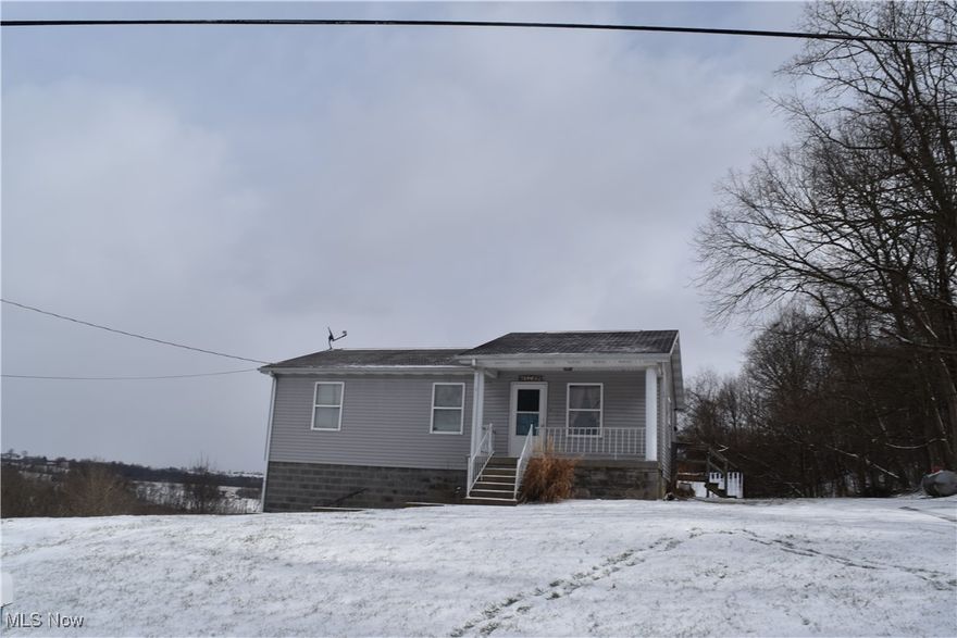 Escape the hustle and bustle without sacrificing convenience! Nestled on a sprawling 6.25-acre lot, this 3-bedroom,1-bath home offers the perfect blend of privacy and accessibility. Whether you dream of starting a hobby farm, building a massive workshop, or simply enjoying the peaceful Ohio landscape from your backyard, this property provides the space to make it happen. Located just minutes from I-70 and the heart of St. Clairsville, you get the best of both worlds: total seclusion and a quick commute to local shopping and dining. Don’t miss this rare opportunity to own a significant piece of land in a prime location!