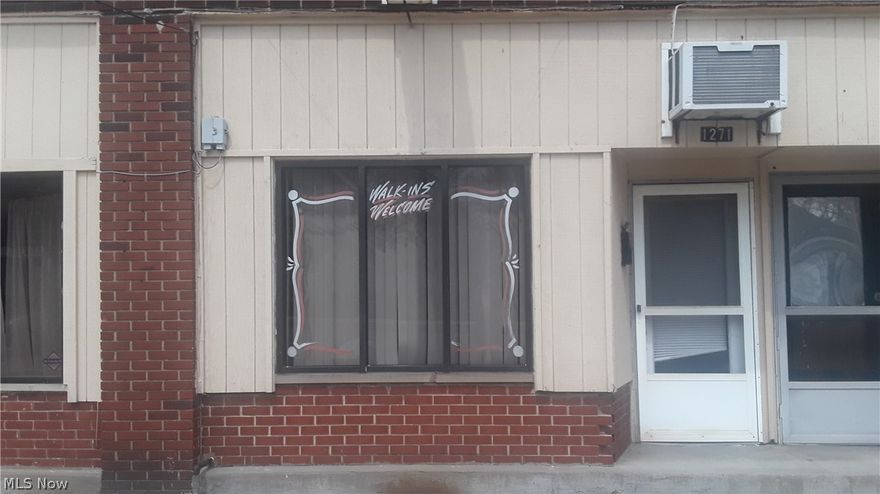 RETAIL or COMMERCIAL Space for a small business. Great space for a creative small business! Located in the center of the small strip plaza  on the corner of W Waterloo and 27th Street. Last space available in building!