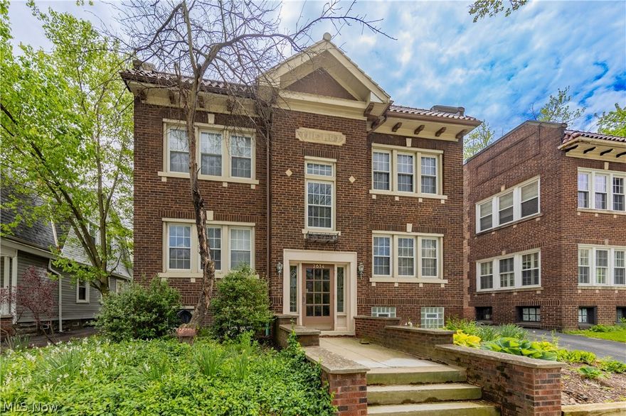 Welcome to this charming Cleveland Heights condominium just minutes away from Little Italy and University Circle! The attractive brick building has a front entry and a convenient back porch entry as well. There is hardwood flooring throughout this comfortable floor plan including the living room, dining room, kitchen, family room and both bedrooms! The gorgeous French doors to the family room were restored and added by the seller! The bathroom has classic tile flooring and pedastal sink. The updated kitchen has granite countertops, stainless steel refrigerator, a gas range, brand new microwave and dishwasher.  Each unit has it's own heat and A/C and the reasonable maintenance fee includes the water bill. the association just replaced the roof. Walking distance to Case, University Hospitals and Little Italy neighborhood shops and restaurants. Best condominium value in the Heights!