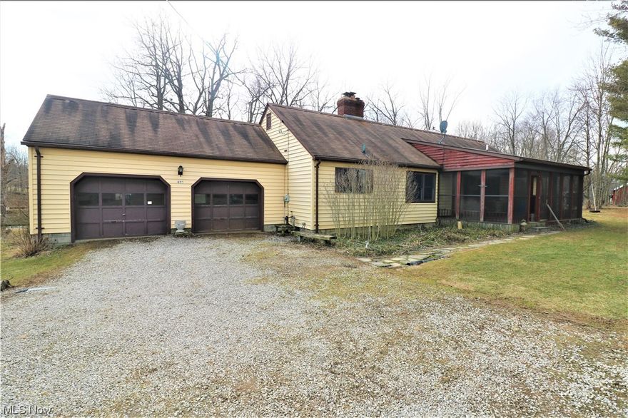 Nature at its best! Country ranch home on approximately 11 acres with 3/4 beds, 1.5 baths, and 2 car attached garage. Home features hardwood floors throughout majority of main floor, natural lighting, ceramic tile, wood beams, and wood cabinets. Walk out basement includes a family room with wood burner and potential office/4th bedroom (carpet was removed many years ago from this room) and opens to patio overlooking flowing creek that runs through property, pond, and heavily wooded corner (approx. 6-7 wooded acres). Enjoy scenic views of nature from the screened in front porch, back bay window or by curling up next to the fireplace! Property also features an area previously used as ATV/dirt bike track, multiple sheds and an abundance of wildlife....even a Bamboo garden! Great location just under 4 miles east of US RT 250 and south of ST RT 18; while only 4.5 miles north of Fitchville!! Don't miss this opportunity to enjoy nature from so many levels with this property!