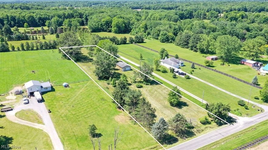 Here is your opportunity to purchase a great building lot to build your dream home on. This property is very appealing with a 24 x32 garage already on the property. It is situated on a quiet country road with easy access to major highways for all your traveling needs. Schedule your appointment to see this nice property sitting on a high and dry sloped lot with plenty of drainage.
