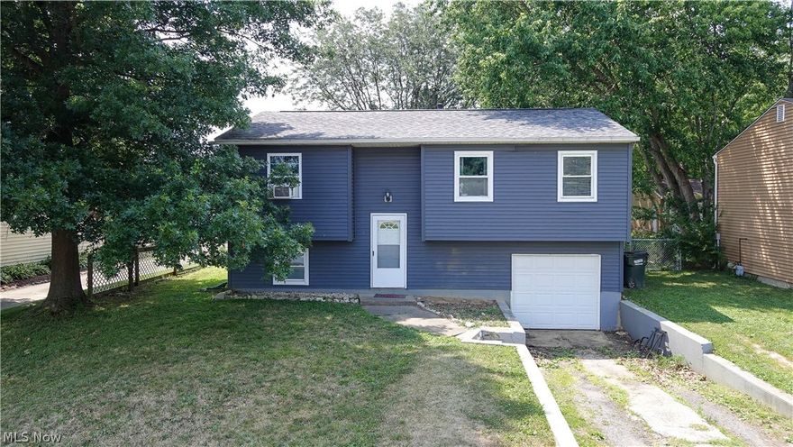 Discover the perfect blend of comfort and versatility in this charming bi-level home. Nestled in a quiet neighborhood, this home boasts four spacious bedrooms and two full baths. The newly built deck out the back sliding door is ideal for outdoor gatherings and enjoying the private fenced in backyard. The kitchen is updated with shaker cabinets, sleek black countertops, and stainless steel appliances. The finished basement features two versatile rooms with egress windows, perfect for crafting your dream master suite or setting up a home office. Experience the convenience of Windham living with nearby amenities and schools, all while enjoying the privacy and tranquility of this beautiful property. New deck 2023, Roof and hot water heater, 2021. Don't miss out on making this your new home!