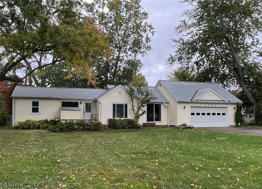 Ranch near Lake Erie features first-floor living! 3 bedrooms and one full bath! This home is waiting for your personal remodeling touches! Family room features a gas fireplace and a sliding glass door that provides entry to the front patio. All Kitchen appliances stay! Laundry space on main floor plus Extra laundry hook ups in basement. Finished Bonus room above the garage! Two car attached Garage also offers an Extra Full Bathroom that is just waiting for a Complete Remodel. Newer Roof Believed to be approximately 4 years young. Outside, the property offers a spacious front yard with a front porch/patio area with numerous possibilities! Fenced in backyard features a deck to set up a cozy seating area, or if you prefer to create a vibrant garden oasis, the backyard provides the canvas for your imagination. Great opportunity to bring this home and lot back to its former beauty! Being sold "As Is" Seller to make no repairs.