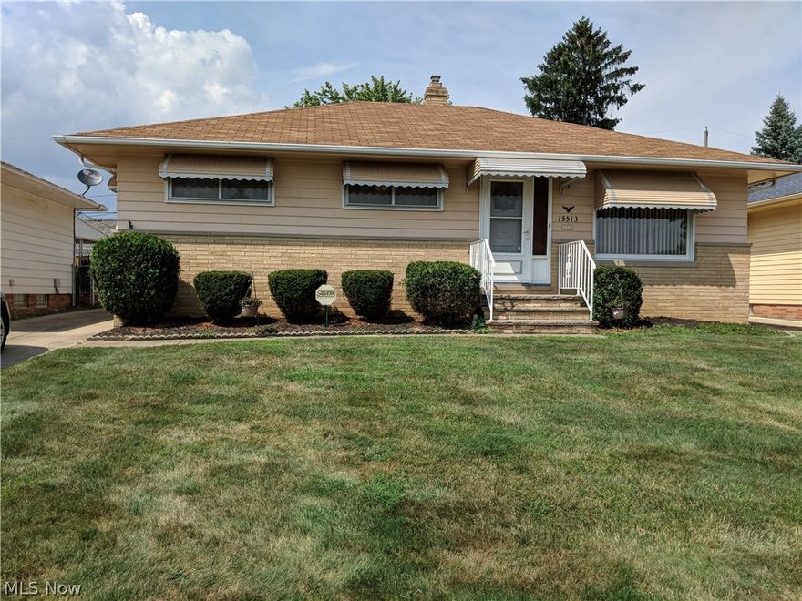 This is a beautiful brick ranch complete with newer carpet, all appliances stay, and a beautiful back yard with a covered patio.  All rooms are tastefully decorated in neutral tones--even the large flat screen TV stays.  There is a lower level carpeted recreation room, workshop area and separate laundry room.  Mechanicals and roof are in great condition.  You can just move right, put up your feet and enjoy a movie on your large flat screen TV.  This home is great for a family or retirees and is on a wonderful, neighborly Maple Heights street.