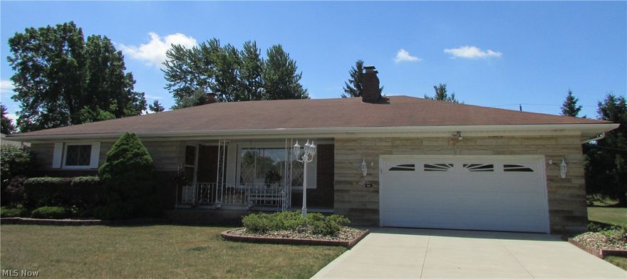 Pristine 3 Bedroom 2 ½ Bath Brick Ranch on Private Lot, Spacious Living & Dining Room Combination has Coved Ceiling & Gas, Stone Fireplace & Leads to Windowed Florida Room w/Ceramic Floor & Ceiling Fan, off of that is a 20 x 20 Deck with outlets and a Gas Line for Grilling, Overlooking a Private Lot. Eat in Kitchen w/Window over Table  Area was updated in 2001 w/all Appliances, Planning Desk & Under/Above Cabinet Lighting, The Huge Master Bedroom is 18 x 14 & has Double Closets, All bedrooms have carpet w/Hardwood Floors underneath, The 40 x 18 Finished Lower Level is a Perfect Place to Entertain with a Wood Burning Fireplace,  Wet Bar & Full Bath, The Lower Level has Glass Block Windows & a Laundry Area w/Washer/Dryer & Built in Cabinets, at the other end is a Workbench & area for Special Projects, There is plenty of storage in this home from the basement to the Attic w/Pull Down Stairs in the Garage, and the Walk in Closet off the Dining Room, Relax on the Private Deck or on the Fron