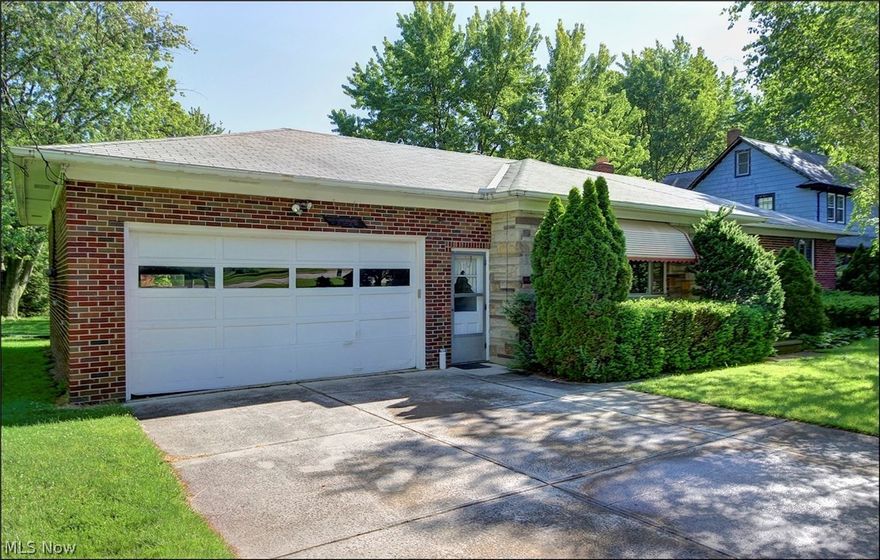 Hip roof brick and stone ranch w/ two and half car attached garage. Located in beautiful Westlake, Ohio. You will love the 93 x 300 ft wooded lot. House features beautiful hardwood Floors and cozy fireplace.  Three bedrooms , gorgeous living room with book cases and fireplace, formal dining room with corner cabinets, eat in kitchen, first floor utility room and enclosed florida room.  Recreation Room in Basement. Your own wooded park like yard.