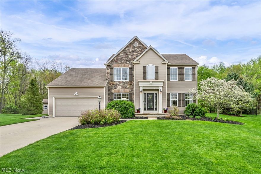 Located on over .3 of an acre premium property on a cul-de-sac in Bayberry Estates within the Wadsworth School District, this beautifully updated home features a finished basement and has access to many community amenities including a pool, clubhouse with fitness center, playground, pond, and walking trails. Main level features hardwood flooring (installed 2020), open layout, and first-floor laundry. Kitchen updated in 2022 with custom wood cabinetry, quartzite countertops, tile backsplash, stainless steel appliances, center island, two breakfast bars with stone accents, and walk-in pantry. Opens to vaulted morning room with access to composite deck (Pella slider 2020), patio, large shed and wooded views. Family room includes a fireplace. Formal dining room with tray ceiling. Flex living room/office. There are a total of 4 bedrooms, 2 full and 2 half baths. Primary suite with vaulted ceiling, walk-in closet, and updated bath (2018) with double vanity, soaking tub, and tiled Roman shower. Finished basement includes rec room, wet bar, refrigerator, half bath, and updated flooring (2021). Key updates: furnace/AC (2021), water heater (2021), sump pump (2026), refrigerator (2021), dishwasher (2019), stove/microwave (2018), Thermatru front door & sidelites (2019), kitchen hood (2020), half baths (2018/2022), custom cedar shutters (2017). Convenient access to I-76, OH-57, shopping, dining, and parks.