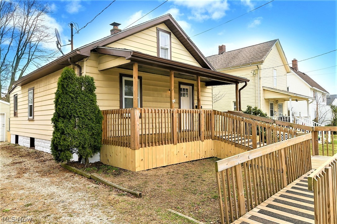 *Low Maintenance FULLY Remodeled MOVE IN READY Ranch! *2 Bedrooms, 1 Bathroom, Full Basement & Garage *FENCED IN YARD! *Wheelchair Accessible Ramp & Walkway W/Railings *Relax On Your Own Covered Front Porch Or Back Deck! *NEW Grey Distressed LUXURY Plank Flooring Throughout Entire 1st Floor **IMPRESS Your Guests As The Living Rm, Bedrooms, Hallway & Kitchen All Have CUSTOM Modern Board And Batten Interior Walls Adding Dimension, Elevating The Space & Creating Dramatic Focal Points Throughout *NEW FURNACE 2021 *Complete BRAND NEW KITCHEN W/CUSTOM Wood Ceiling, Triple Farmhouse Style Jar Pendant Lighting In Eat In Area, White Arcadia Shaker Style Cabinets With Corner Lazy Susan, Oversized Stainless Steel Pulls, BUTCHER BLOCK Countertop, SS Sink & Faucet, Frigidaire Black And Stainless Steel GAS Oven With Middle Griddle, Frigidaire Dishwasher And More! *Convenient Door To Backyard Deck Off Of Kitchen *BRAND NEW Bathroom W/White Tub And Shower Surround, Stainless Showerhead & Faucet, SHIPL