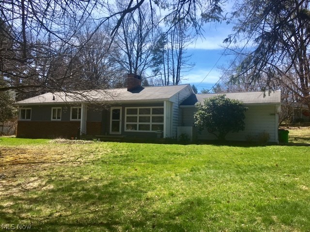 Dont miss this exceptionally remodeled, corner lot ranch in the desirable Green School District! This beauty boasts care free, one floor, open concept living with refinished hardwood floors throughout (2008), a brand new kitchen with high end stainless appliances (2014), dining room with built ins, and a stunning feature wall gas fireplace. The first floor bathroom completely renovated too! (2011) The sunny living with its huge Pella picture windows overlooking the large front lawn, also connects to the fantastic screened in back porch, with a view to the back yard offering an organic Hugelkultur installation. Down the hall you will find the 3 bedrooms, including the very serene master. Modern color palate throughout. Basement is a perfect rec room space and offers a full bathroom, plus an incredible amount of additional storage. New electric panel in 2008. One car attached garage and additional parking in the newer driveway turn around. All of this situated on a beautiful treed