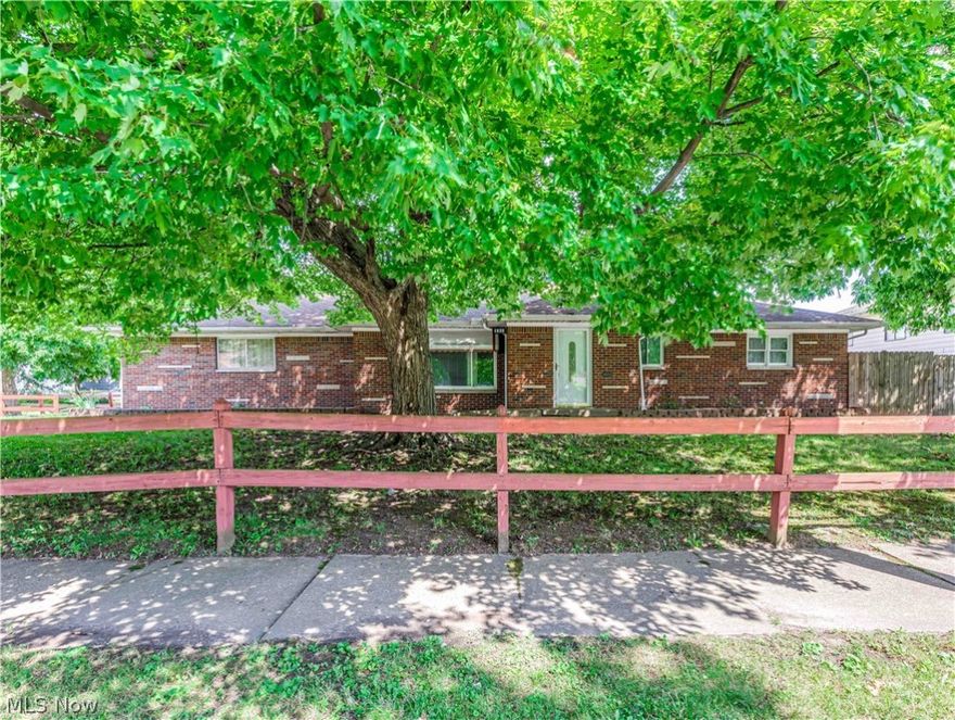 Welcome, Home to this spacious3-bedroom brick ranch home situated on a large corner lot with easy access to the expressway and downtown.  You will walk into the large living room with lots of natural sunlight and a wonderful fireplace for those chilly Ohio Winters.  The large eat-in kitchen can be accessed through either the garage, living room, or family room (which also has direct access to the backyard).  Three large bedrooms and a full bath complete the first floor.  The basement is large and at one time was completely finished.  Laundry and a full bath are located in the dry basement.  Updates include New carpeting and freshly painted, New Furnace, 2021, New Roof 2015, and newer windows.