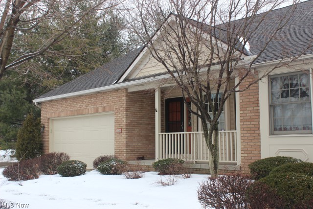 Spacious & well cared for 2 bedroom, 2 bath condo built 1992 with 1680SF centrally located in Green* Vaulted Great room with gas log fireplace* Formal dining* Eat in kitchen fully appliance (range, refrigerator approx. 2 yrs., dishwasher & disposal)* Vaulted 4 season sunroom with slider to patio* 1st floor master bedroom & bath with garden tub & separate shower* 1st floor laundry including washer & dryer* Upper level with guest bedroom, bath & loft with skylight & walk in storage* Unfinished 12 course basement* 2 car attached garage with keyless entry* Covered front porch (6x14)* Patio* Furnace (approx. 2007)* Ceiling fans in most rooms* Neutral décor* Home warranty provided*