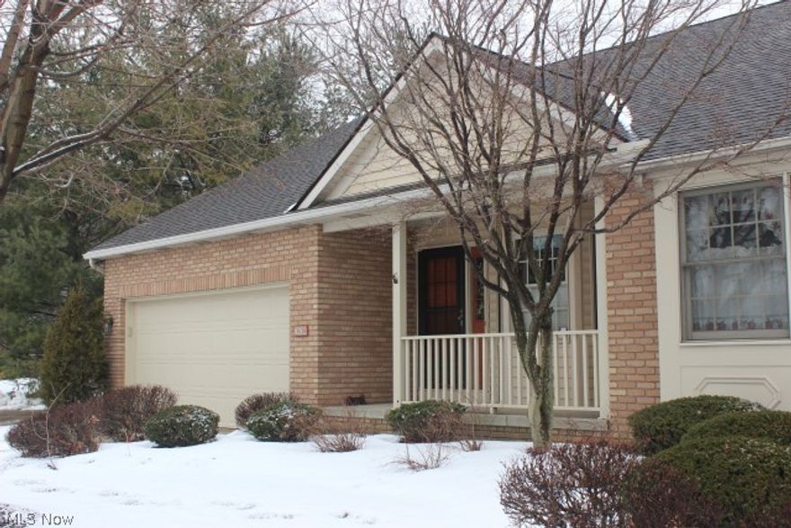 Spacious & well cared for 2 bedroom, 2 bath condo built 1992 with 1680SF centrally located in Green* Vaulted Great room with gas log fireplace* Formal dining* Eat in kitchen fully appliance (range, refrigerator approx. 2 yrs., dishwasher & disposal)* Vaulted 4 season sunroom with slider to patio* 1st floor master bedroom & bath with garden tub & separate shower* 1st floor laundry including washer & dryer* Upper level with guest bedroom, bath & loft with skylight & walk in storage* Unfinished 12 course basement* 2 car attached garage with keyless entry* Covered front porch (6x14)* Patio* Furnace (approx. 2007)* Ceiling fans in most rooms* Neutral décor* Home warranty provided*