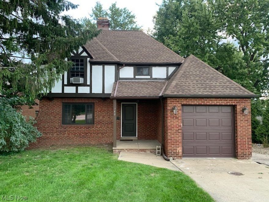 Location, Location, Location!!  You are just a few minutes from I-480, 176 and I-77.  You can be downtown in ten minutes.  Watch the Indians fireworks from your kitchen window or from two of your bedrooms upstairs.  So many updates in this house!  Brand new tear off roof in 2014, new high efficiency central air condition in 2015, new high efficiency furnace in 2015, new garage door and opener in 2017, new 200 amp electrical panel in 2017, new dishwasher 2017, new fridge 2018, renovated bathrooms 2018, new front door 2019 and all new paint on first floor in 2020.  This 3 bedroom, 1.5 bath is ready to move in.  Walking through the front door you are welcomed into a perfect sized living room with fireplace and two big windows. There is a den/office attached followed by an eat-in kitchen with beautiful bay window.  The kitchen has white cabinets, storage and beautiful black appliances.  The first floor is topped off with a recently renovated half bath.  Upstairs you find the master bedroom