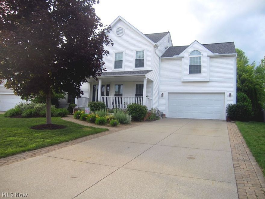 Spacious Colonial with room for everyone! This home has it all! Four spacious bedrooms including an on-suite master that is 24 x 13 with luxury master bath, updated with double sinks and vanity with solid surface countertops. Amazing walk-in closets and more. The front and rear yards are professionally landscaped. Seller added a gorgeous paver patio that is covered, with skylights and a natural gas grill that stays. Spacious kitchen has quartz countertop, stainless sink and the charming eating area is bayed. Kitchen has pantry and there's a butler's station between the kitchen and dining room. Both second floor baths are updated and have skylights. The main bath has a private commode room. Laundry is on the second floor. All new vinyl replacement windows in 2013 (double hung, tilt for cleaning). Roof is new in 2009, tear off with 30 yr. shingles. Enjoy Cuyahoga Falls utilities and amenities.