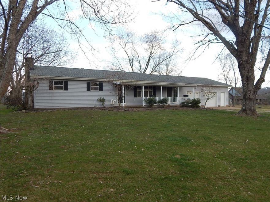COUNTRY LIVING IN DAVISVILLE!
This ranch style home is nestled on 2.8+/-  acres and makes for easy commutes to Parkersburg!  
This 2,000 + Square foot 3 bedroom, 3 full bath home has a 2 car, attached, oversized garage!  Inside, you can see the kitchen is the heart of this home with loads of custom cabinets and is open to the massive family room that overlooks the huge back yard and pole barn!  The master suite was updated and the master bath has double vanities and a gorgeous walk-in shower! Downstairs, there is a partially finished basement with a finished rec room that mimics a football field with a bar area and fridge! Outside, the spacious yard is big enough for a few animals and the pole barn has electric and water so, it can be a hobby shop or house some small animals!  This location feels like you’re hours from town but, you’re minutes away!  Don’t wait!  Call today.