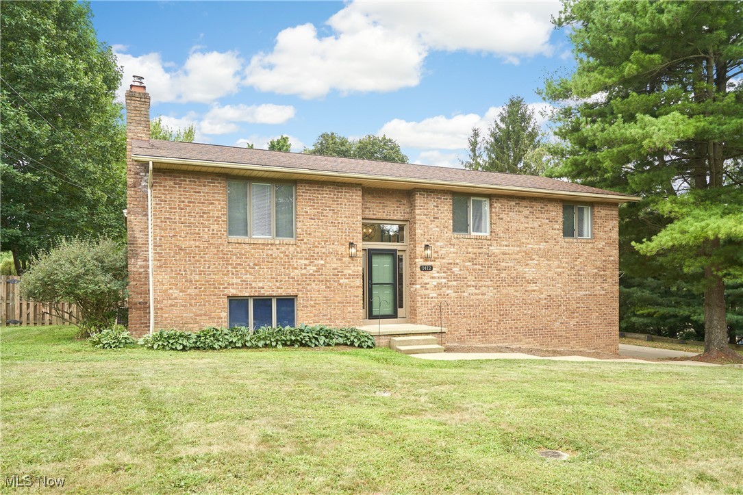 Completely renovated 3BR 2BA bi-level beauty on a nearly ¾ acre private lot in Green Schools! This unique home starts at the fabulous foyer leading you up to the open concept main floor with spacious living room, updated kitchen with stainless steel appliances & breakfast bar open to dining room area w/ double pane door to massive 4-season sunroom w/ vaulted ceiling, fan, recessed lighting, and slider to private newer rear deck. The main floor also features a cozy primary suite w/ modernized bath featuring double sink vanity & walk-in shower, plus two additional well-appointed bedrooms and add’l full bath. Also featuring 2-car attached garage, fenced in backyard w/ fire pit, and finished lower level w/ rec room that has a wood burning fireplace plus a spacious laundry room! The home has new flooring, fans, closet shelving, lighting & hardware throughout plus a new water softener! Conveniently located < 5 min drive to CAK, I-77, Nimisilla Reservoir or Boettler Park!