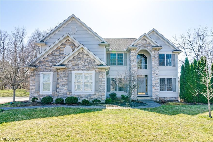 Unbelievable architectural design and style! Looking for the wow factor? This is the home for you! Open 2 story foyer that leads to an incredible 2 story great room surrounded by palladian windows that allow the tranquility of mother nature's beauty and light to shine into the home even on a cloudy day. The great room with yellow birch hardwood floors opens up to the gorgeous gourmet kitchen with load of cabinetry. Off the kitchen and great room is a magnificent 4 season sun room to enjoy all the seasons. The large dining room and first floor office are off the foyer. The 2nd floor over looks the great room and the owner suite is massive. There are two large walk in closets with built-ins. You will love the master bath. The lower level walk out with 2nd kitchen, fireplace, additional office, bedroom and full bath. updates, 2020 85 gal h20 tank, 2018 furnace, 2015 great room yellow birch hardwood, 2008 basement 2 rooms added and kitchen.