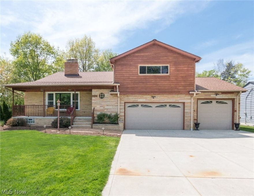 Stunning updated Brick, Stone and Cedar Split-Level! The first floor features a cozy family room with wood burning fireplace! The expansive kitchen with granite countertops, center island,  butler pantry and wood burning fireplace. The Spacious 3 season room which provides the perfect spot to host friends or family and walks out to a gorgeous stamped patio and  firepit! The  upstairs provides 4 large bedrooms and 2 beautifully redone full baths with  floor to ceiling tile! The master bedroom includes a walkout balcony which overlooks the backyard!  The Lower Level  is completely finished with full kitchen, freshly updated full bath, recreation room, and food/wine cellar. The front of the house features a beautiful concrete front porch! Three car garage!   Additional features include intercom system, recently updated 200 amp service, hot and cold water taps in garage, out shed, and cedar closet in basement and garden! Do not let this home pass you by as it will move fast! Schedule your