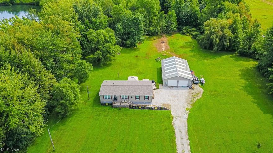 "Take me home, country roads!" Situated in Sheffield Township, this open concept, 3 bedrooms and 2 full bathrooms beautiful manufactured home (2021), is on a crawlspace and a generous 144 feet off the road w/250’ of road frontage. The kitchen, with its massive island, is perfect for meal preparation or as a buffet area when entertaining guests. A large pantry provides ample storage space for all your needs. In the primary bedroom, there is a spacious ensuite bathroom and a generously-sized walk-in closet. Down the hallway from the dining area are the remaining bedrooms and utility/laundry area. The tilt in windows make cleaning a breeze. Open the slider to the back deck, relax and enjoy the tranquil evenings. A 32x53, 4 car outbuilding maks it ideal for car enthusiasts or hobbies. For those who love the outdoors, a deer blind is hidden among the woods of this extraordinary property. *Sellers are under contract for their next home